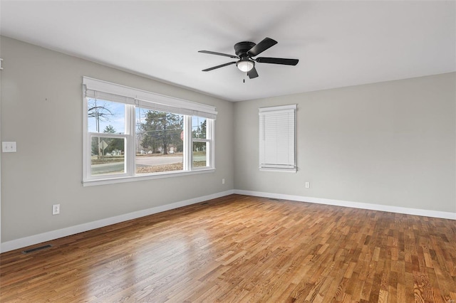 unfurnished room featuring light hardwood / wood-style flooring and ceiling fan