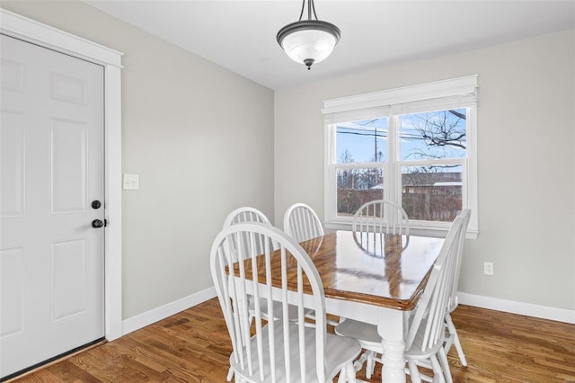 dining area featuring hardwood / wood-style floors