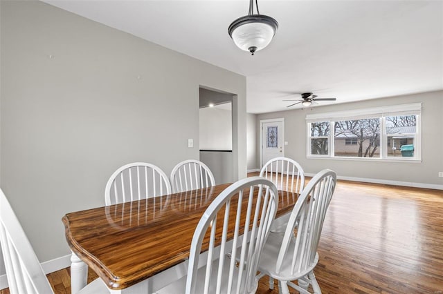 dining area featuring ceiling fan and light hardwood / wood-style floors