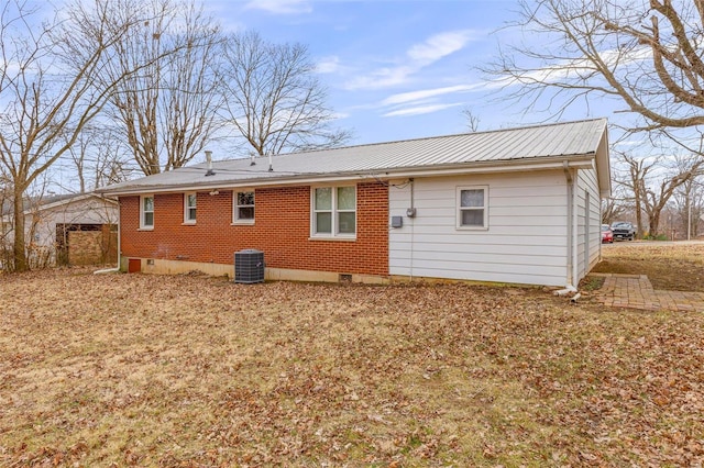 back of property with central AC unit