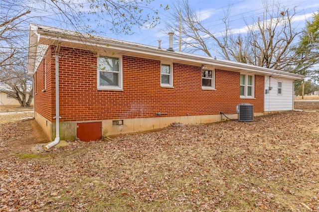 view of property exterior with cooling unit