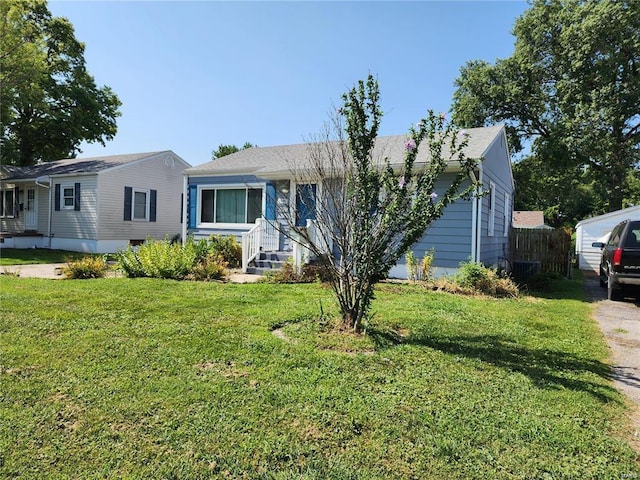 ranch-style house with a front yard