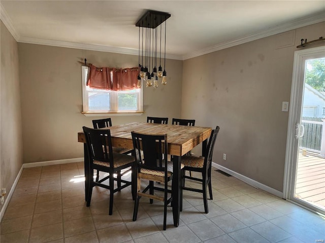 dining room featuring ornamental molding, light tile patterned floors, and a notable chandelier