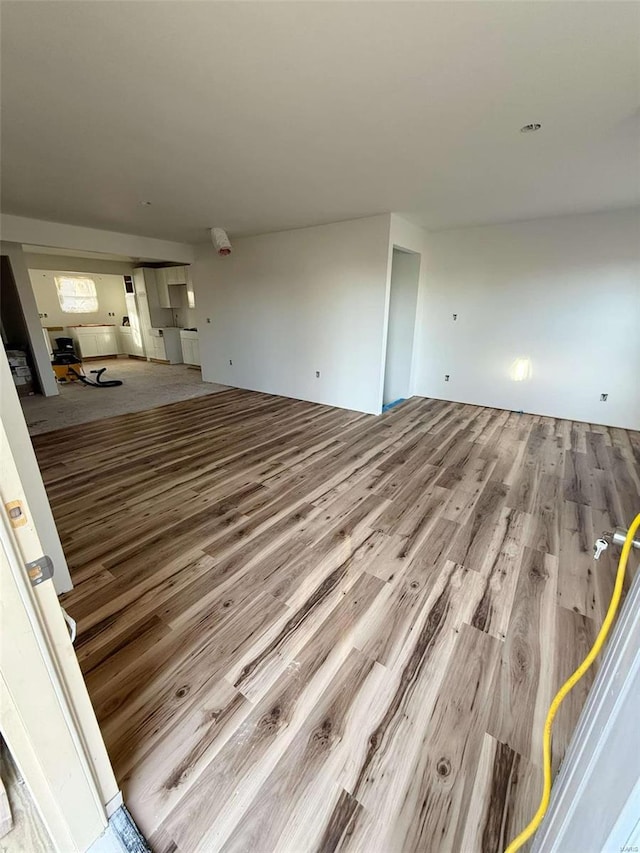 unfurnished living room with light hardwood / wood-style floors