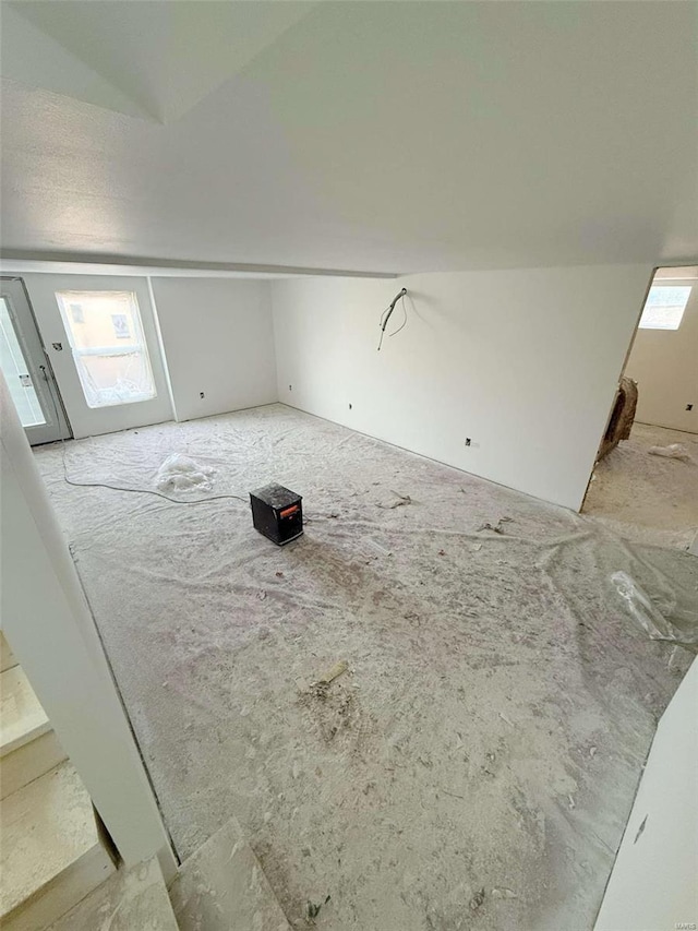 bonus room featuring lofted ceiling