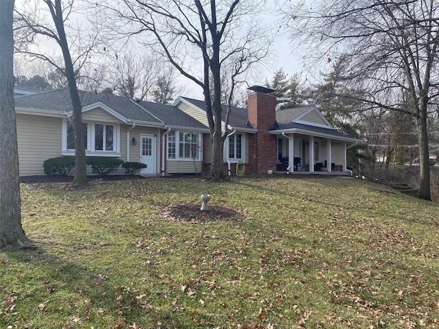 ranch-style house featuring a front yard