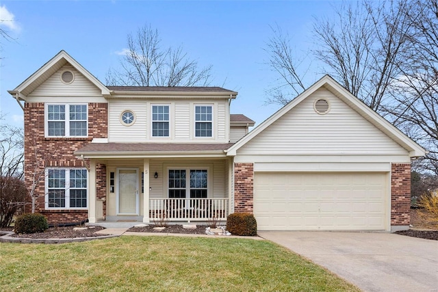 view of front of property featuring a garage, a porch, and a front yard