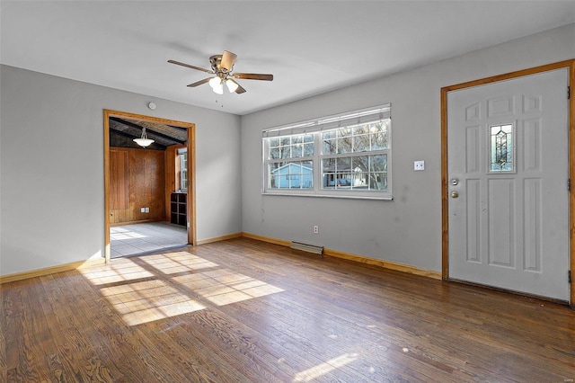 foyer entrance with wood-type flooring and ceiling fan