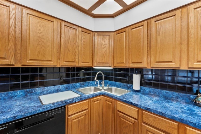 kitchen featuring sink, decorative backsplash, and black dishwasher