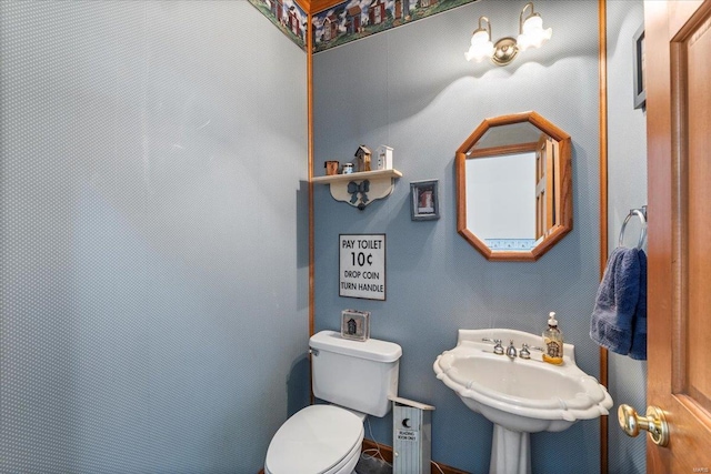 bathroom with sink and toilet