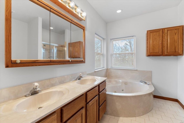 bathroom with tile patterned flooring, vanity, and independent shower and bath