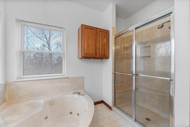 bathroom featuring independent shower and bath and tile patterned floors