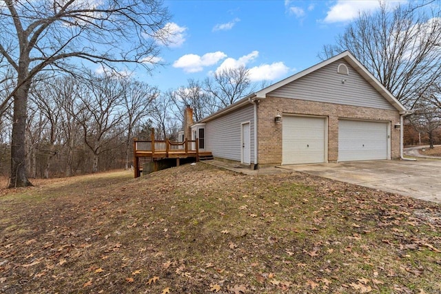 view of side of property featuring a wooden deck