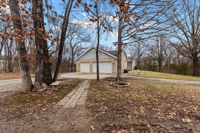 view of side of property with a garage