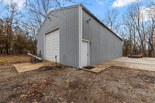 view of outbuilding with a garage