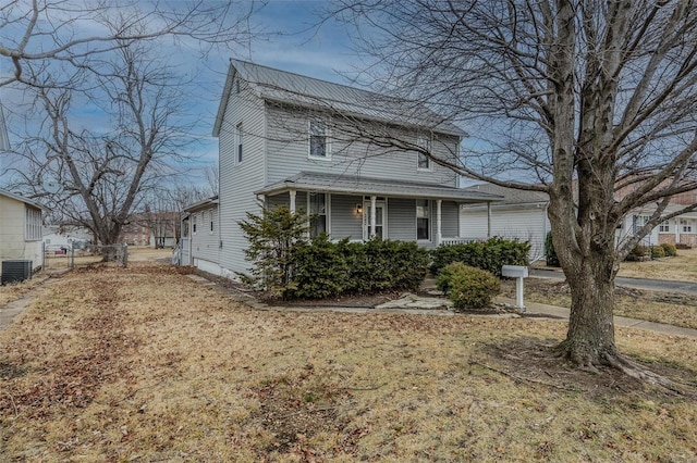 view of front of property featuring central AC and covered porch