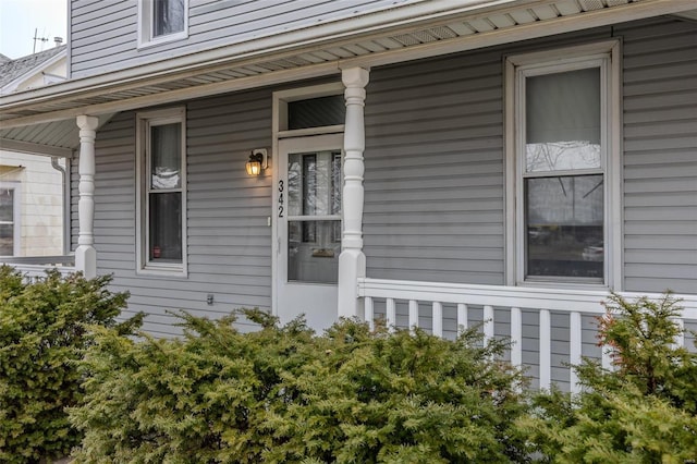 entrance to property with a porch