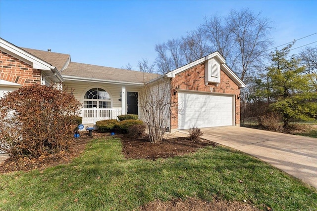 ranch-style house featuring a garage and a front yard