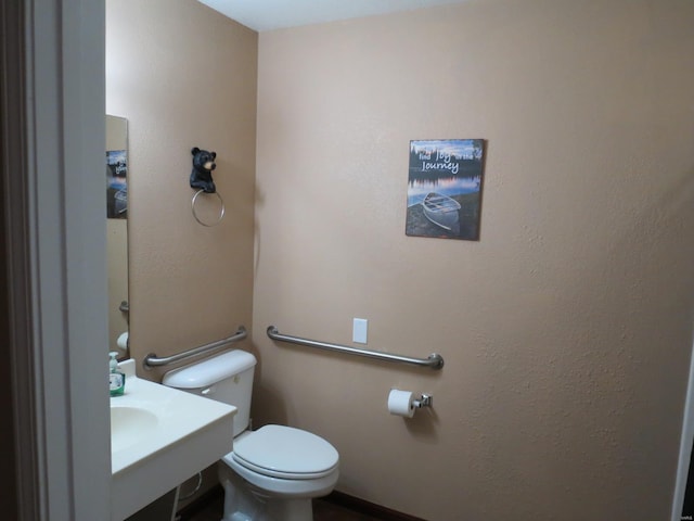 bathroom featuring toilet