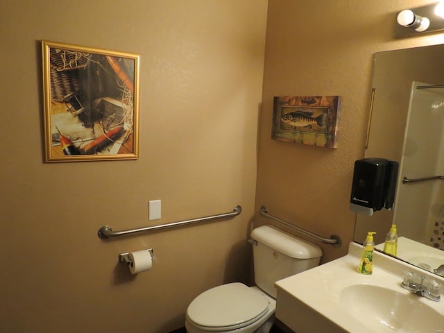 bathroom with sink and toilet