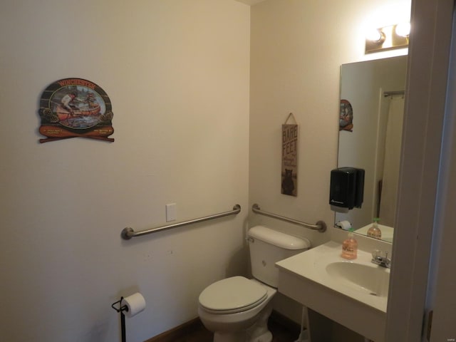 bathroom with sink and toilet