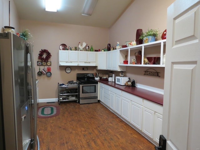 kitchen featuring dark wood-type flooring, stainless steel appliances, and white cabinets