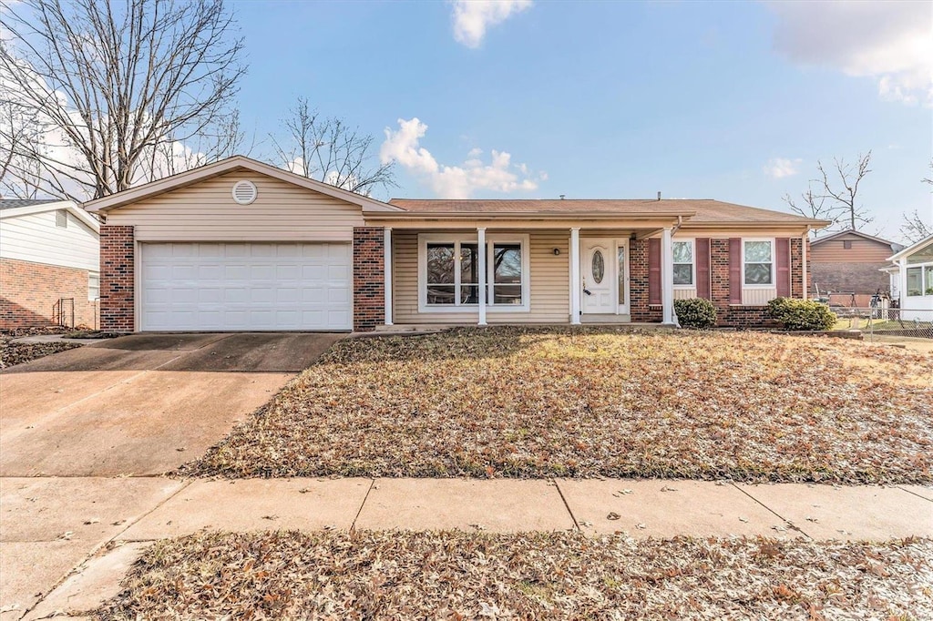 single story home featuring a garage