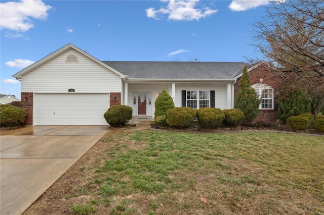 ranch-style home with a garage and a front yard