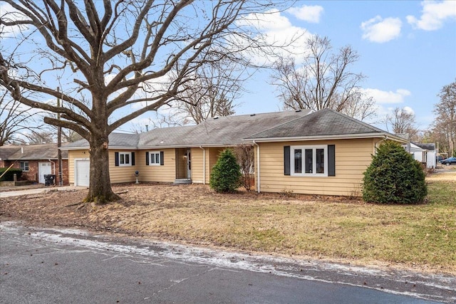 single story home with an attached garage