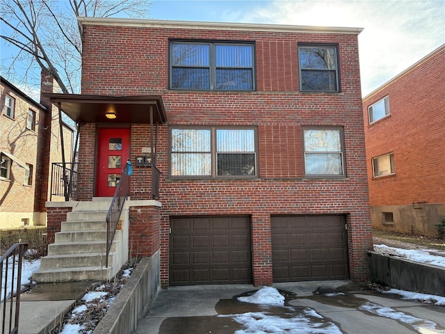 view of front of property featuring a garage