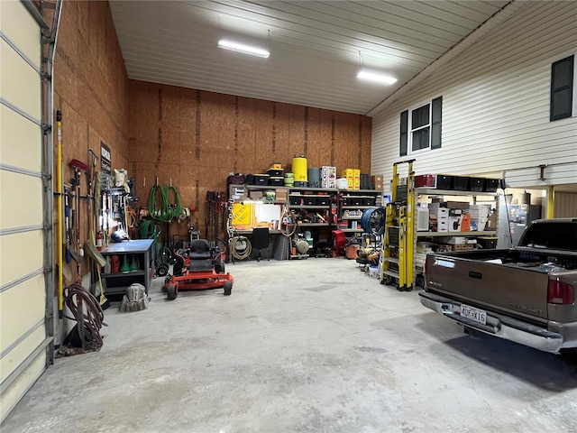 garage with a workshop area