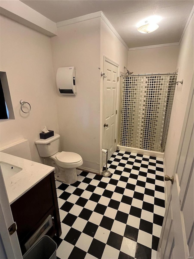 bathroom featuring ornamental molding, curtained shower, vanity, and toilet