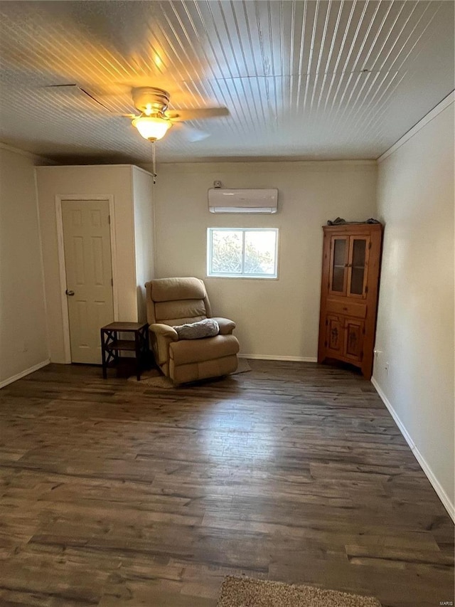 unfurnished room with a wall mounted air conditioner and dark hardwood / wood-style floors