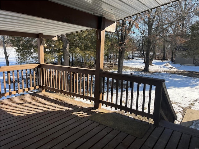 view of snow covered deck