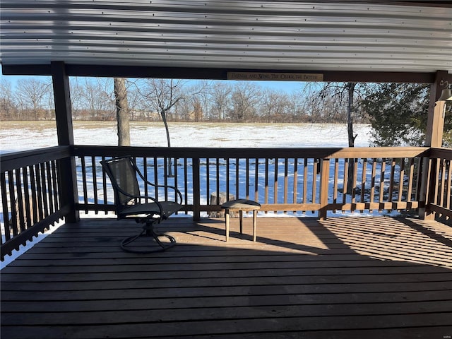 view of snow covered deck