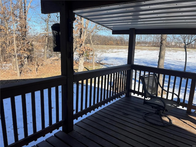 view of snow covered deck