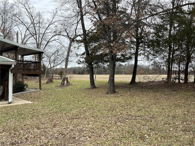 view of yard with a wooden deck