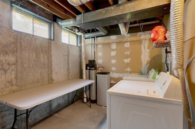 washroom with independent washer and dryer