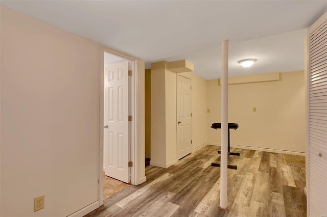 exercise room featuring hardwood / wood-style flooring