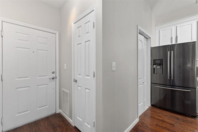 interior space with dark hardwood / wood-style flooring