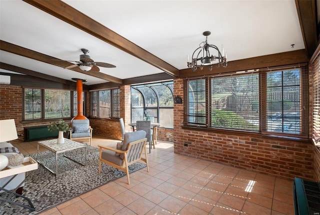 sunroom / solarium featuring beamed ceiling and ceiling fan with notable chandelier