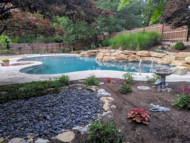 view of pool with a fenced in pool and a fenced backyard