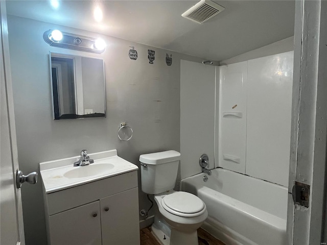 full bathroom with vanity, toilet, and washtub / shower combination