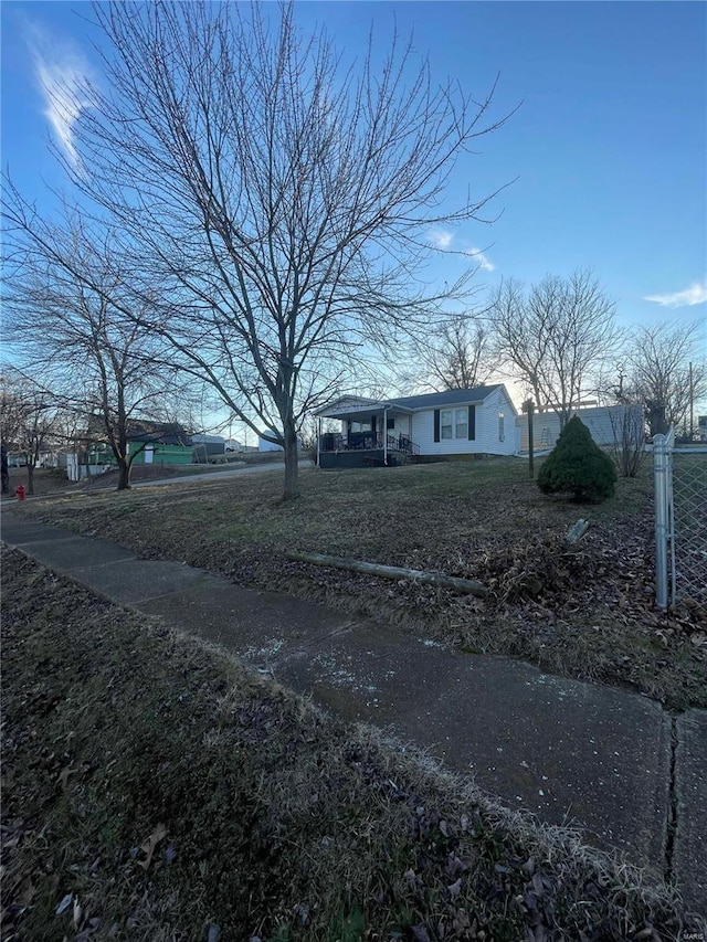 view of front of home with a front yard