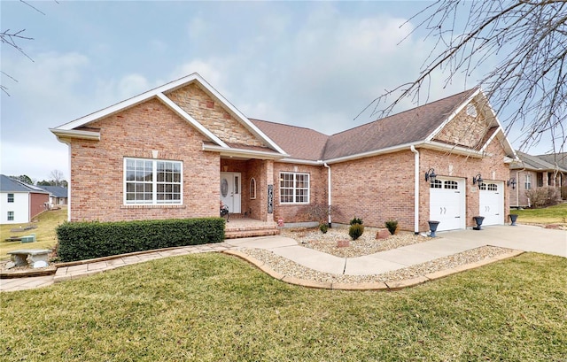 view of front of property with a garage and a front lawn