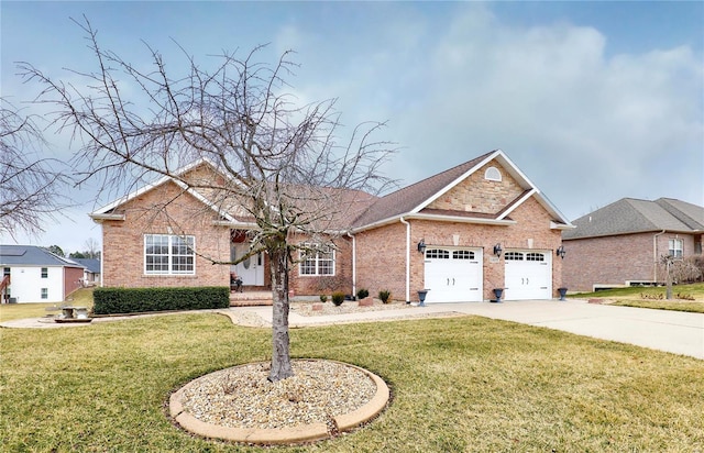 view of front of home with a garage and a front lawn