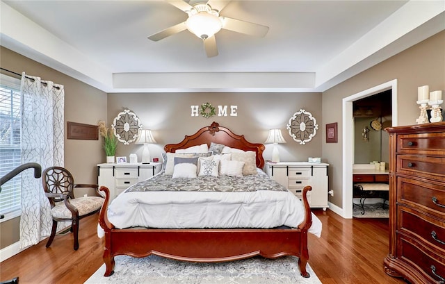 bedroom with wood-type flooring and ceiling fan