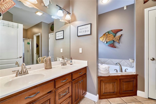 bathroom featuring vanity, independent shower and bath, and tile patterned flooring