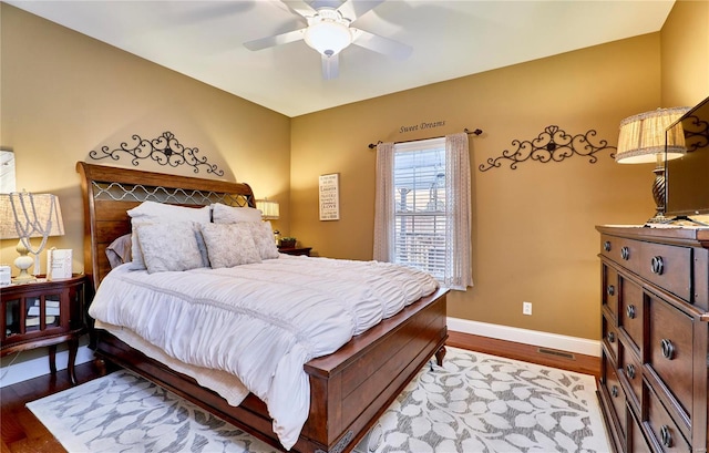 bedroom featuring ceiling fan and wood-type flooring