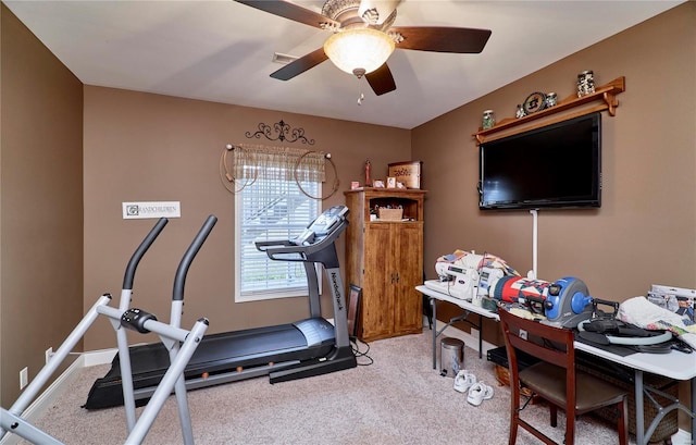 exercise area with carpet floors and ceiling fan